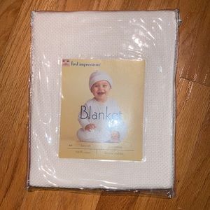 Baby NWT soft cotton blanket. First Impression.